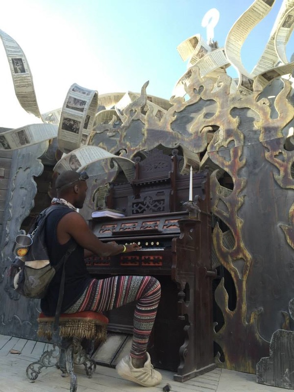 Ishmon Brown playing piano outdoors